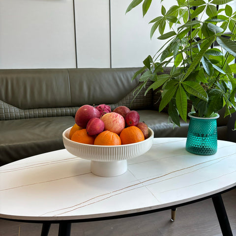 JolieJulie bowl filled with fruit on counter providing organized, attractive display