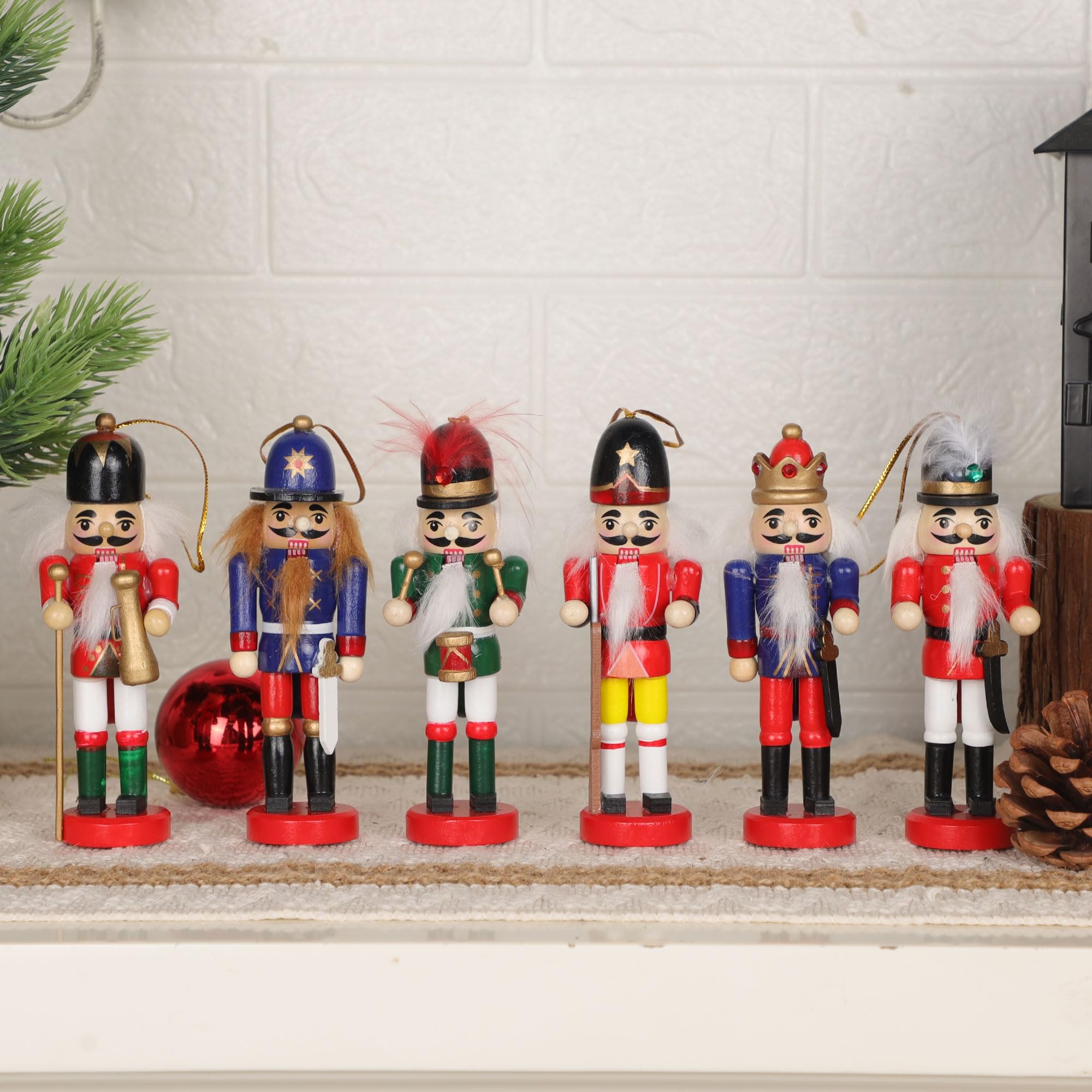 Joliyoou nutcracker next to a ruler showing accurate 5.1 inch size for small spaces