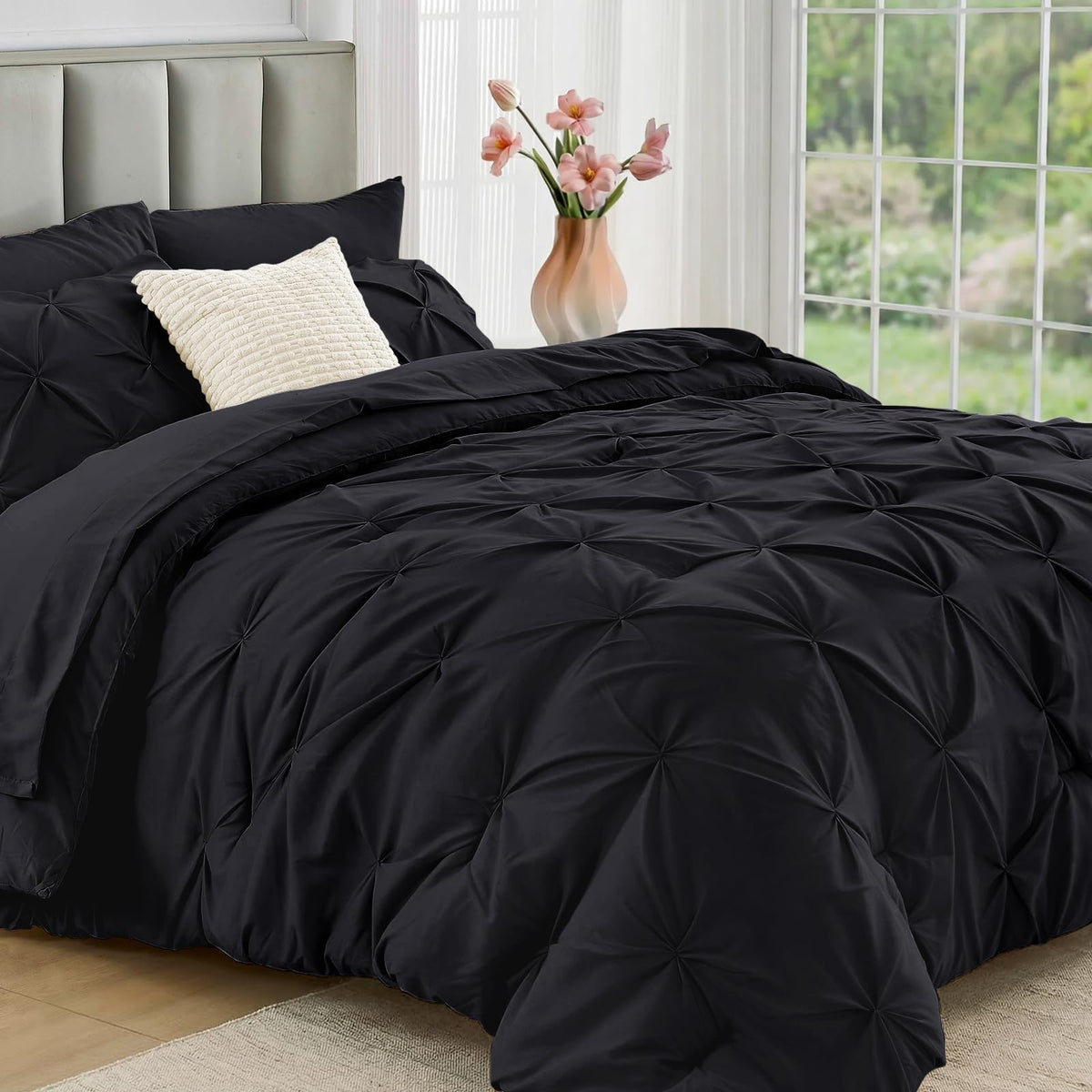 JOLLYVOGUE black comforter front view showing sleek pintuck and modern look