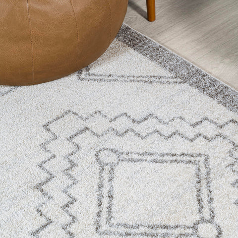 JONATHAN Y rug placed in living room demonstrating scale and cohesive styling benefit