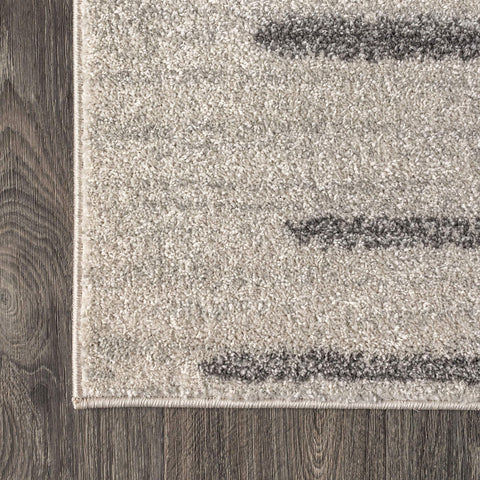 JONATHAN Y rug at bedside, soft low-pile for comfortable step-out surface