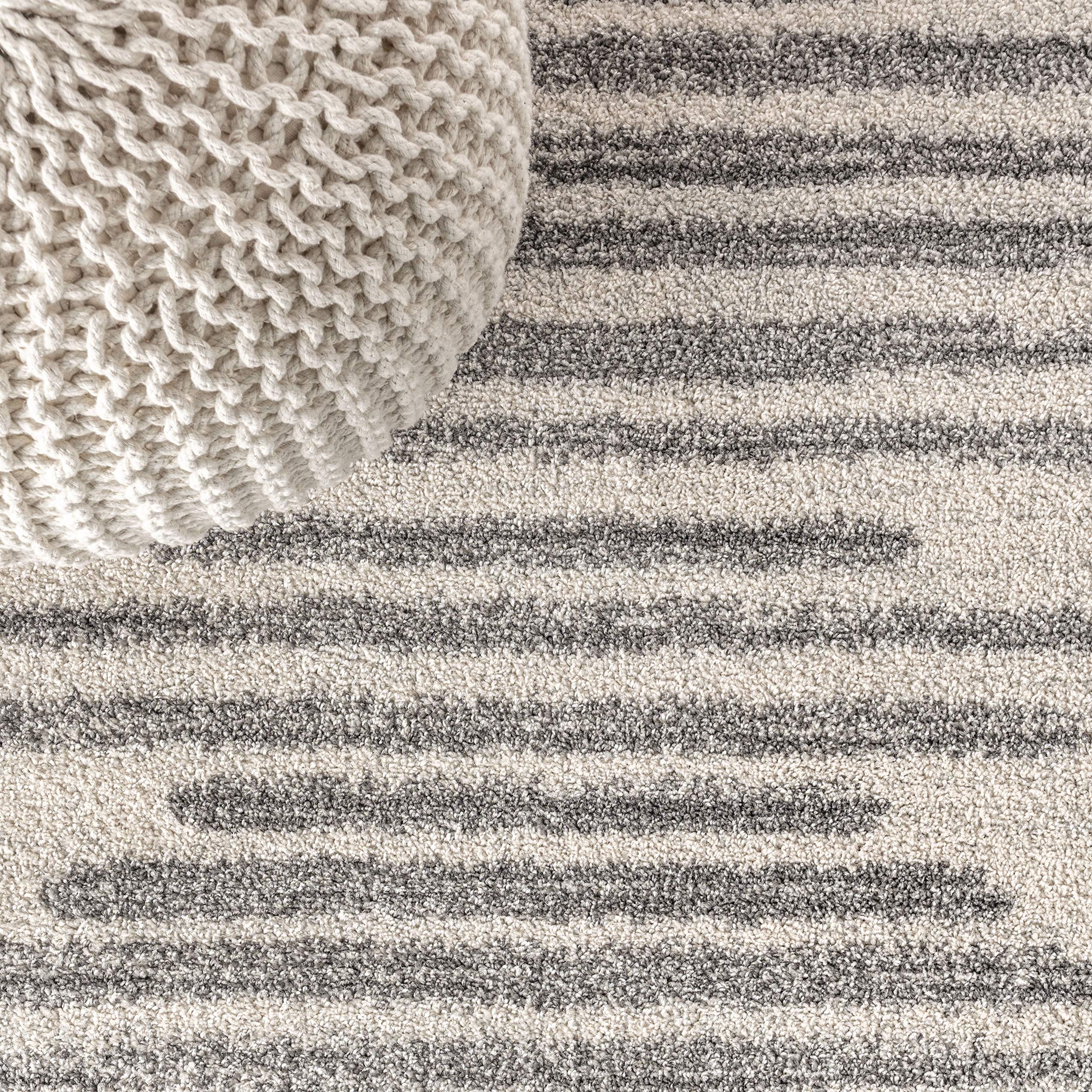 JONATHAN Y rug edge and jute backing visible, demonstrates stable durable construction