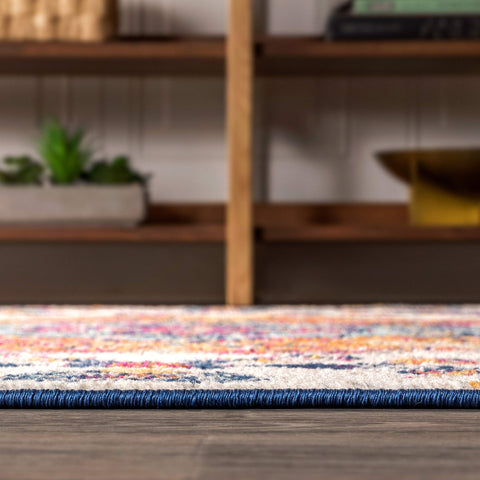 JONATHAN Y rug styled at foot of bed — softens bedroom and reduces noise