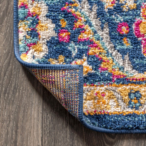 JONATHAN Y rug at kitchen entrance — easy-clean surface for busy areas