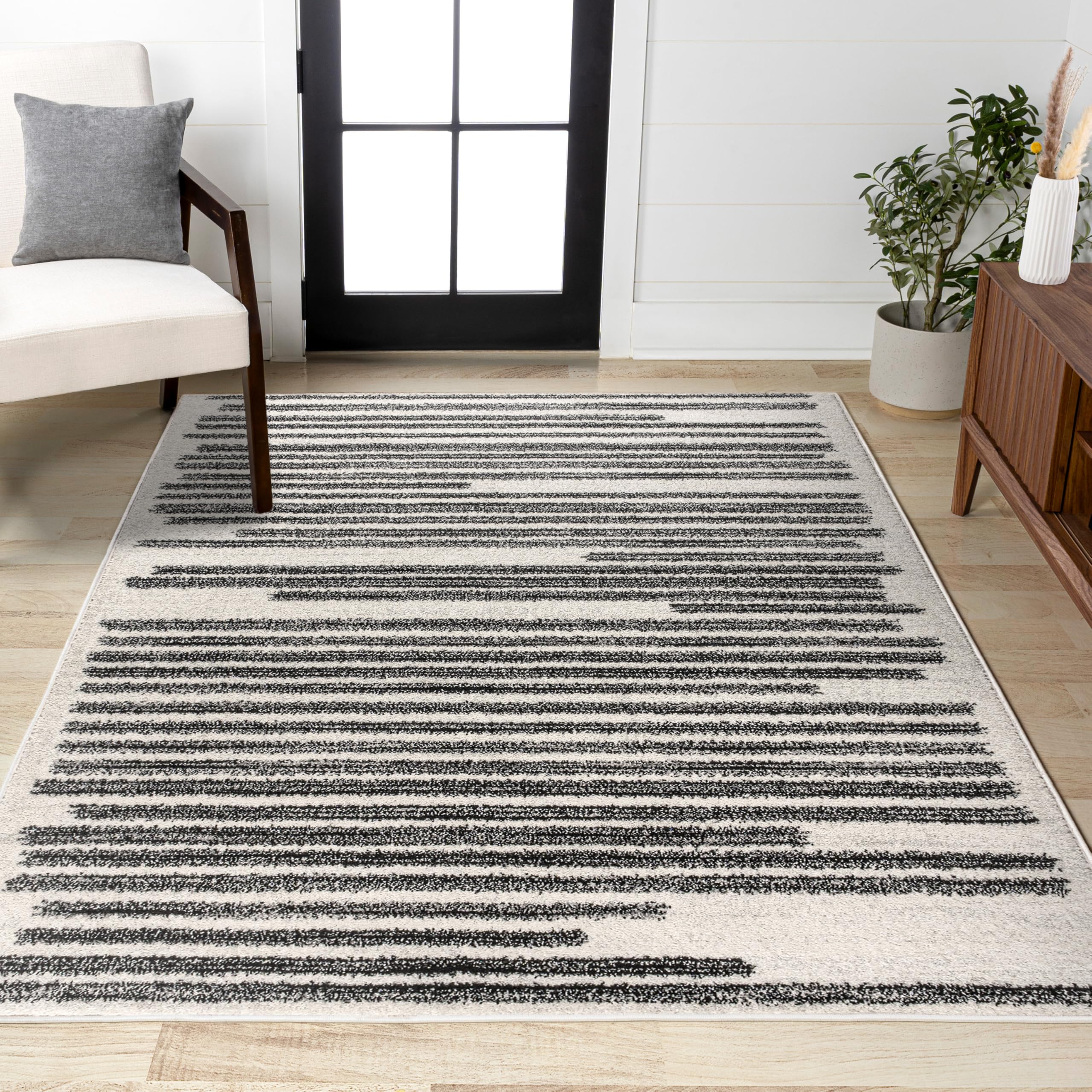 JONATHAN Y rug corner and jute backing visible for durable, non-slip support