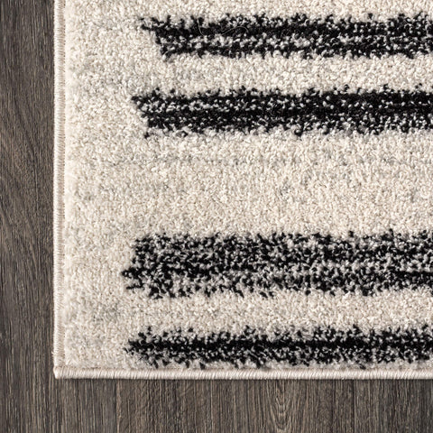 JONATHAN Y folded edge detail highlighting machine-woven finish and neat hems