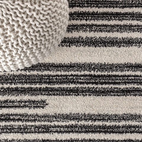 JONATHAN Y Khalil rug in living room setting anchoring sofa and coffee table