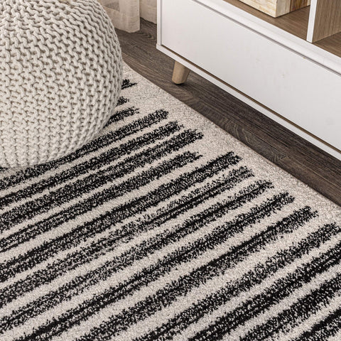 JONATHAN Y pet lying on Khalil rug showing pet-friendly, stain-resistant surface