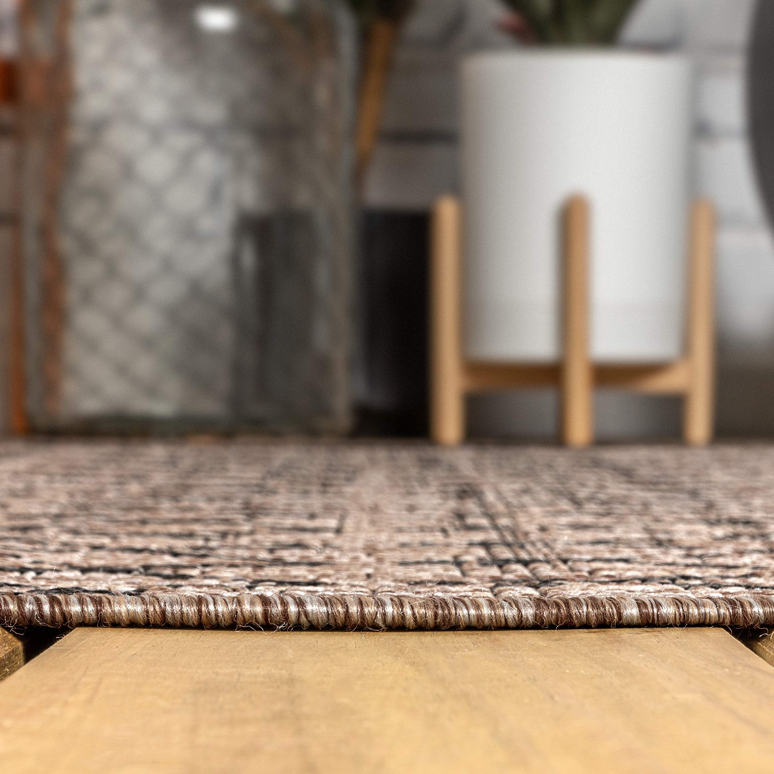 JONATHAN Y rug with pet on surface illustrating pet-friendly durability