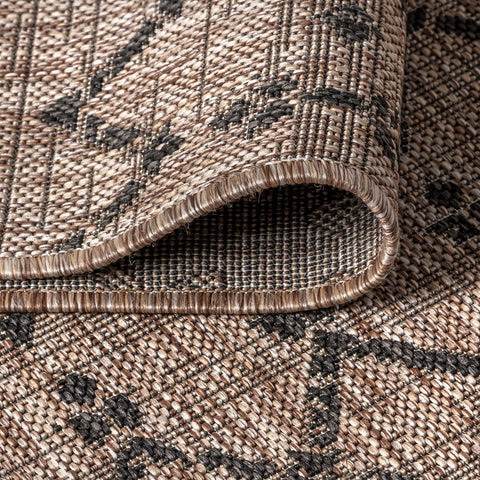 JONATHAN Y rug beneath furniture showing 9x12 scale and zone definition