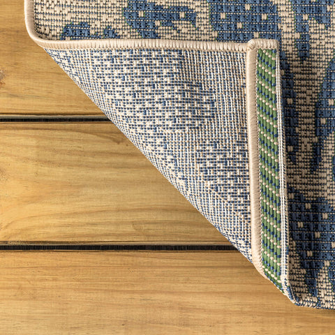 JONATHAN Y rug styled on porch showing outdoor-ready look and curb appeal benefit