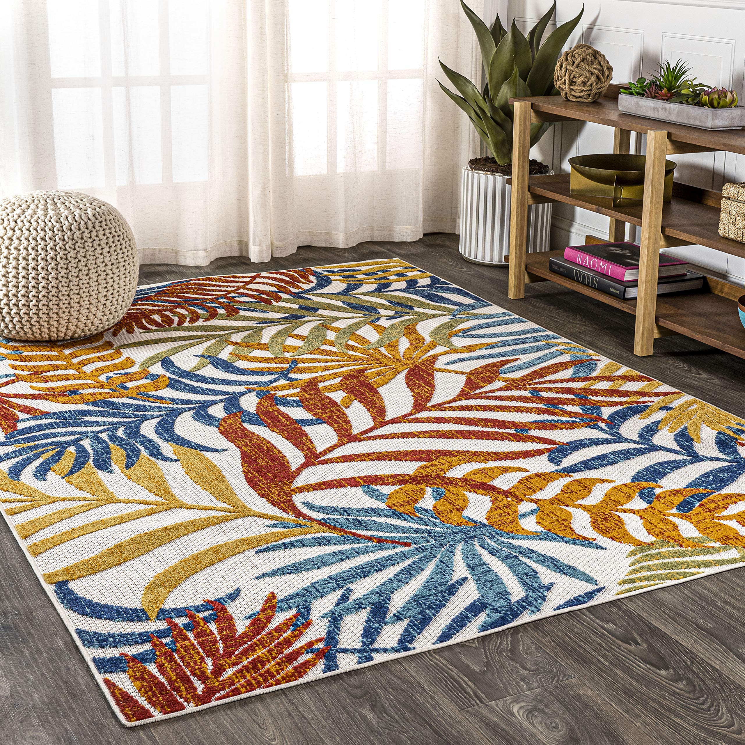 JONATHAN Y lifestyle shot in sunlit room showing tropical pattern brightening decor