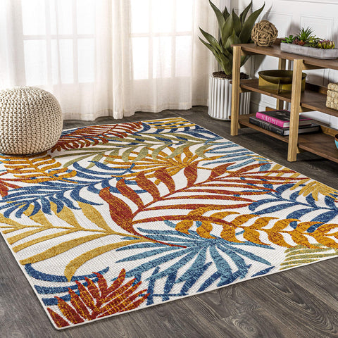 JONATHAN Y lifestyle shot in sunlit room showing tropical pattern brightening decor