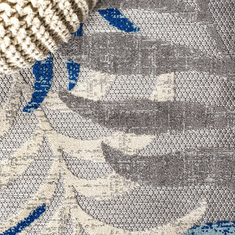 JONATHAN Y patio scene showing rug suited to covered outdoor entertaining