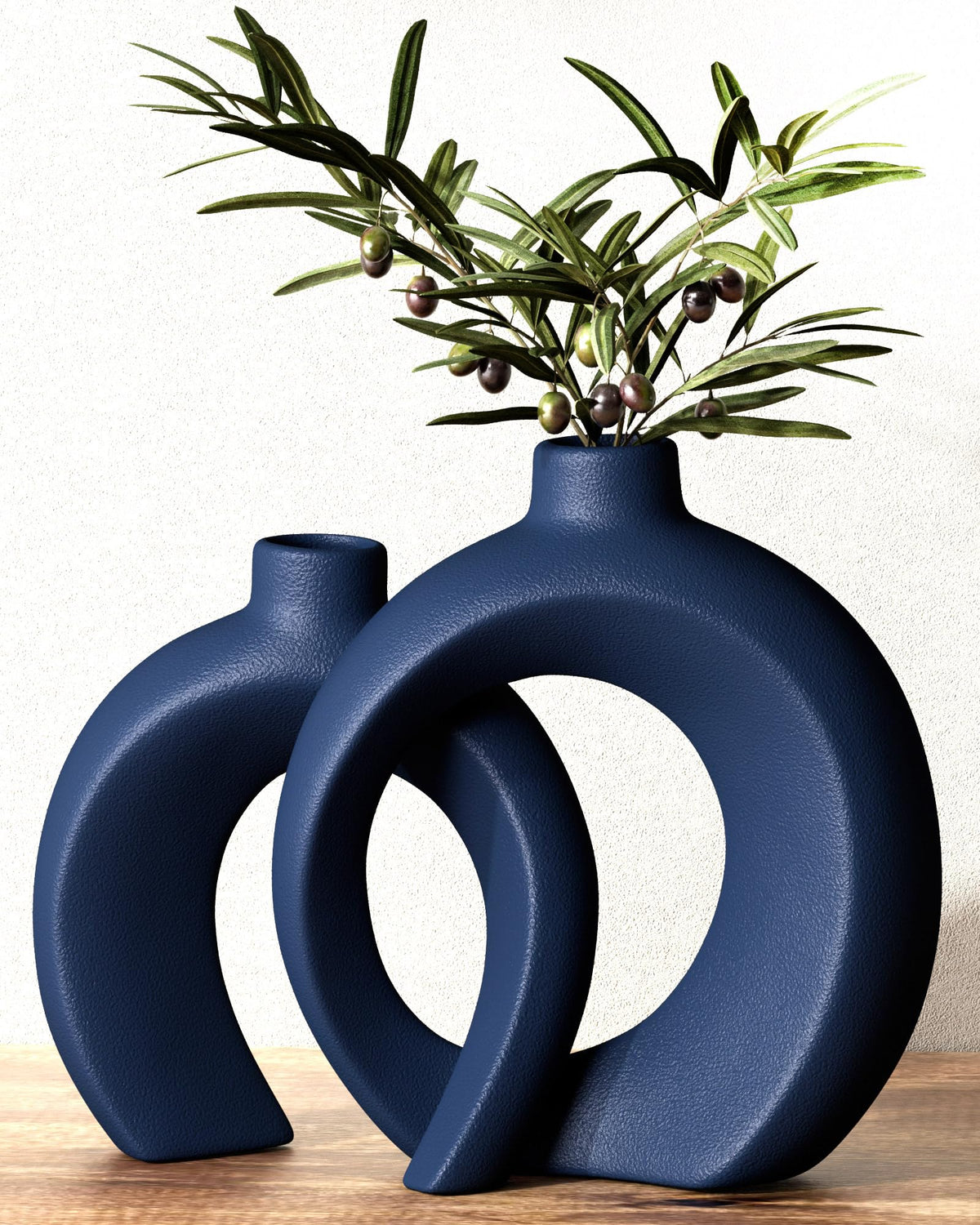 Jonronboci front view of both navy vases showing sculptural shape and balance