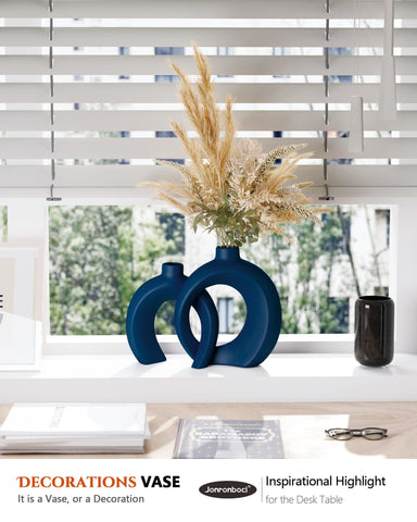 Jonronboci styled on living room console adding calm coastal color and form