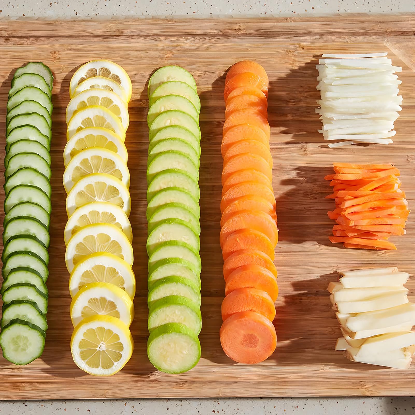 Jonscook julienne action shot producing uniform vegetable sticks for salads