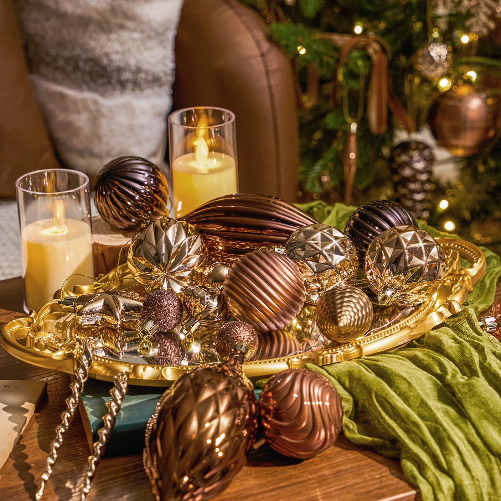 JORNOY mantel and centerpiece styling demonstrating cohesive brown holiday decor
