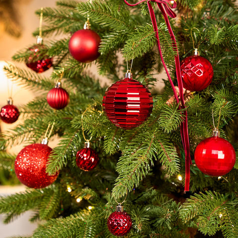 JORNOY ornaments in hand showing size scale and lightweight safety