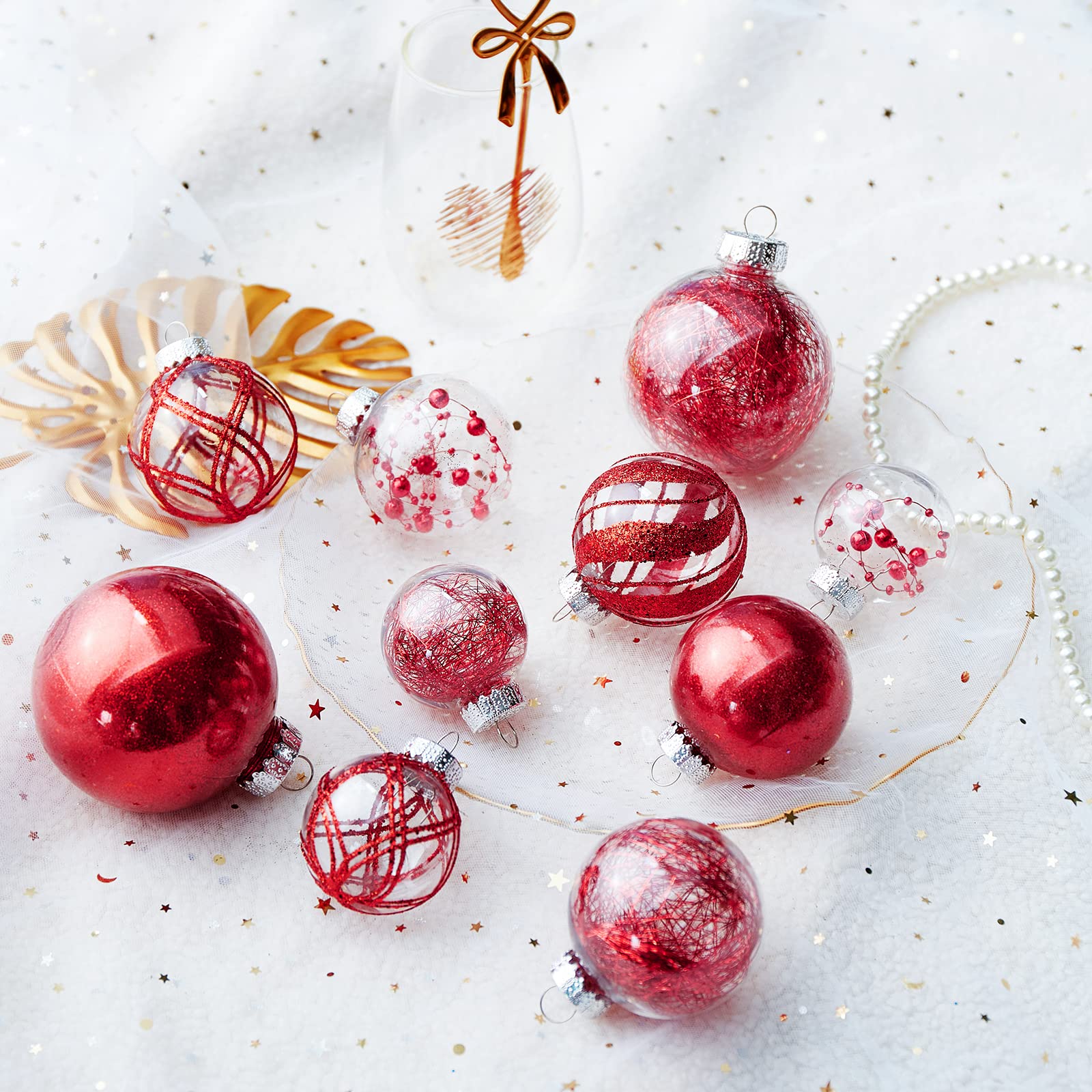 Jorysics decorative table centerpiece featuring mixed-size clear red baubles