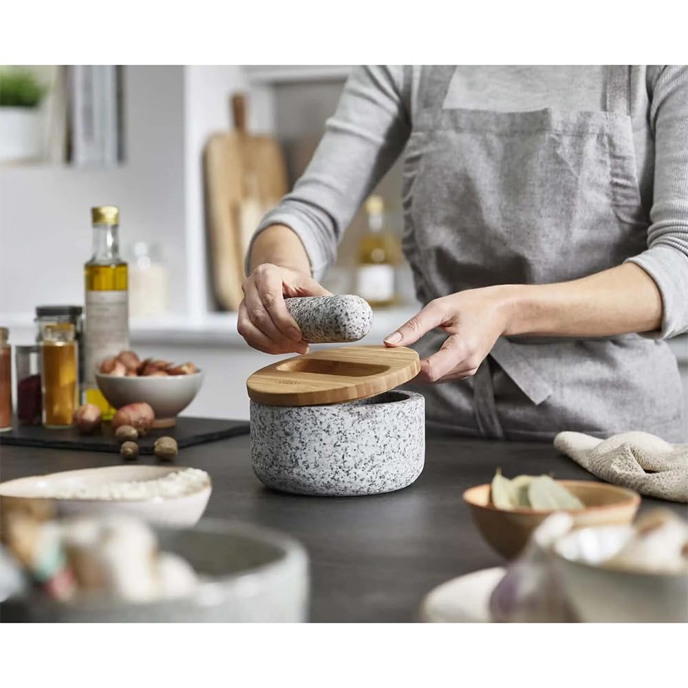 Joseph Joseph Dash pestle stored on lid, tidy countertop storage benefit