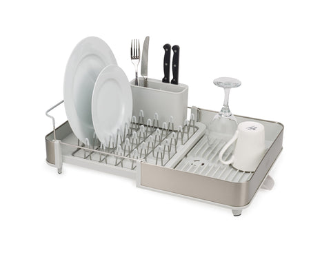 Joseph Joseph front view of stainless-steel drying rack showing compact footprint and extendable tray benefit