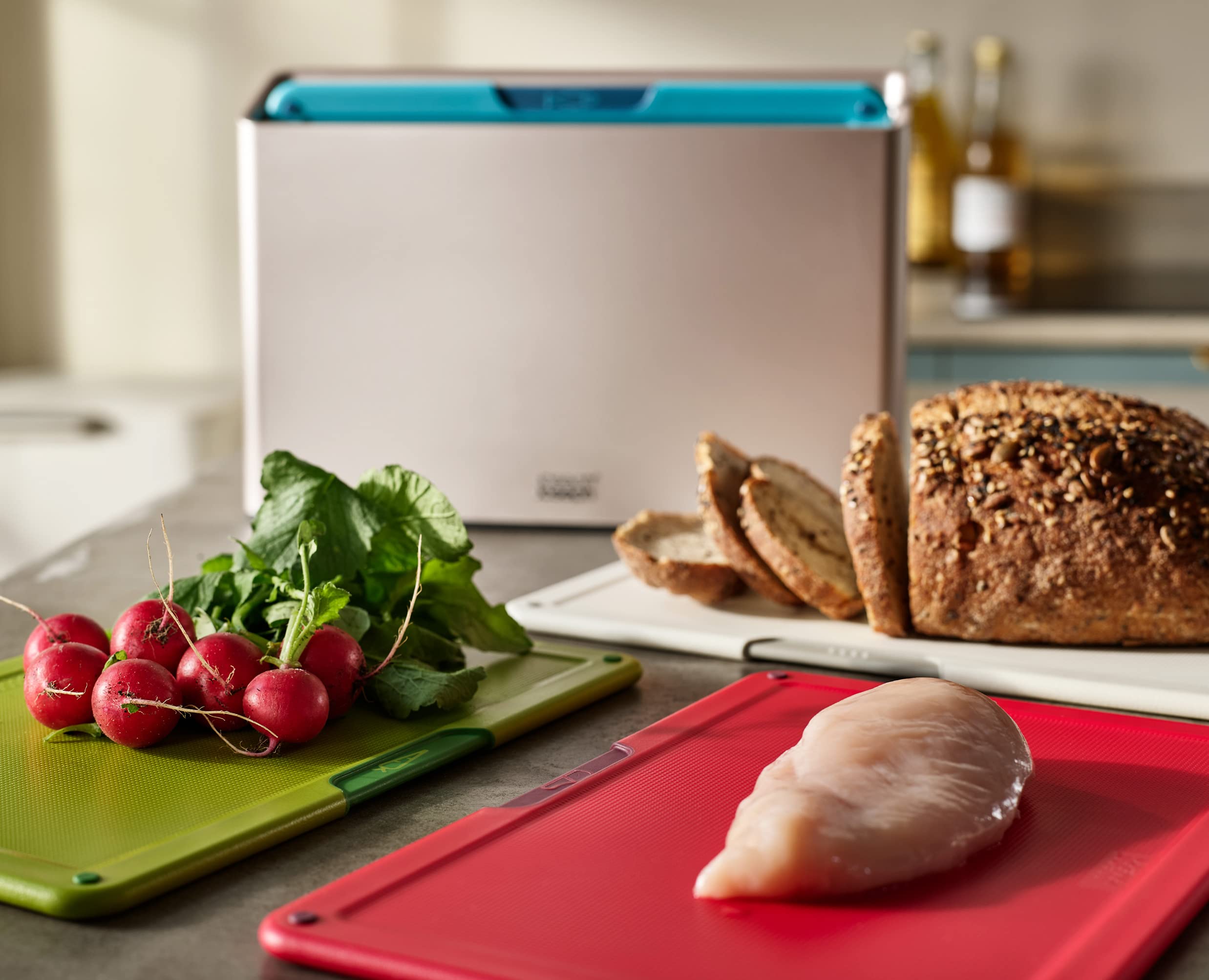 Joseph Joseph close-up textured surface protecting knives while stabilising food