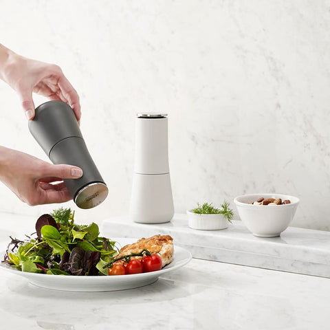 Joseph Joseph mill held in hand to show size and easy handling for daily use