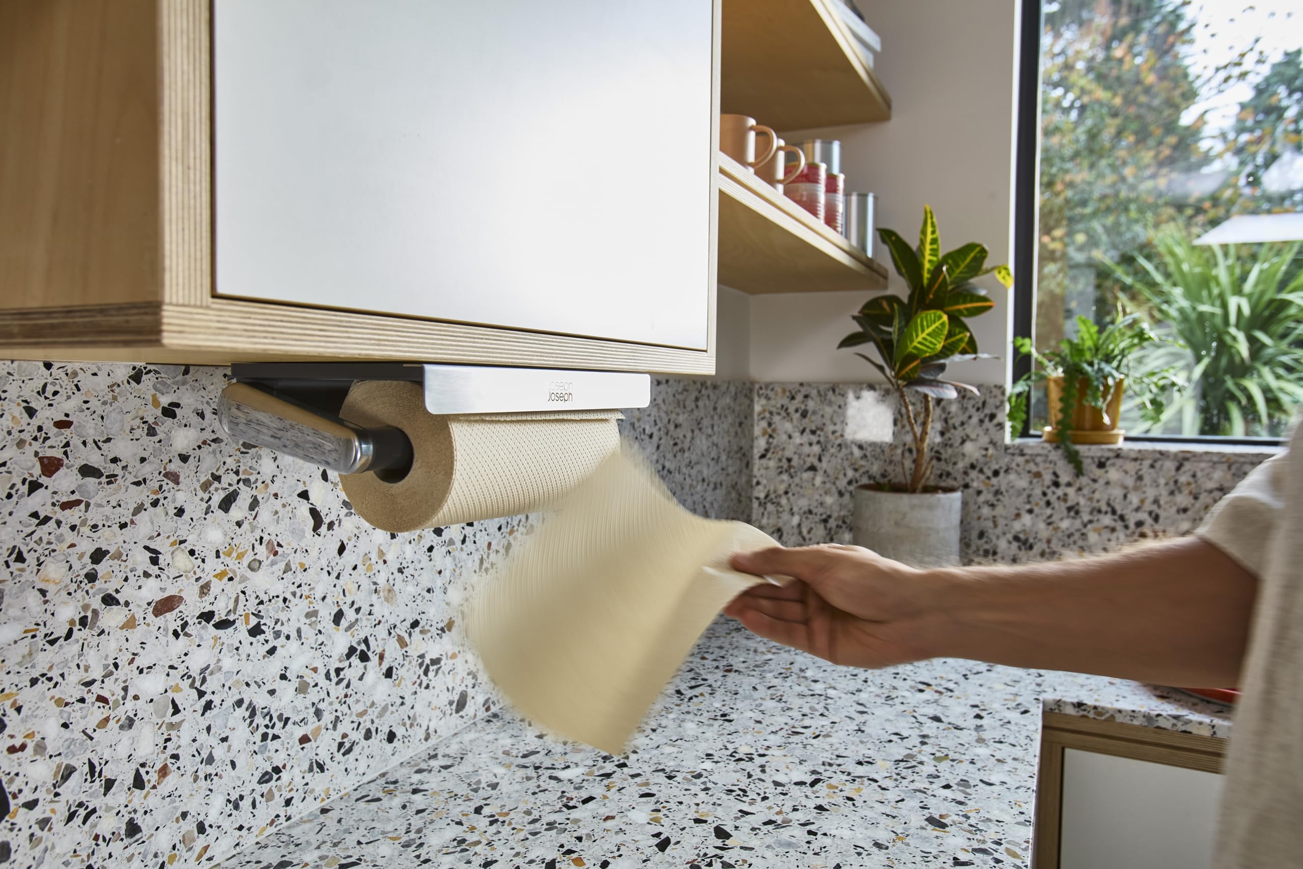 Joseph Joseph RollGrip mounted under cabinet demonstrating space-saving storage and neat appearance