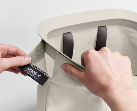Joseph Joseph helper handle at bag base for controlled, spill-free emptying