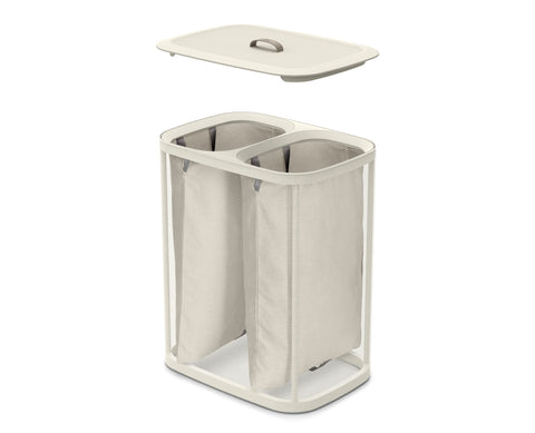 Joseph Joseph Tota in bathroom setting demonstrating discreet, stylish laundry storage