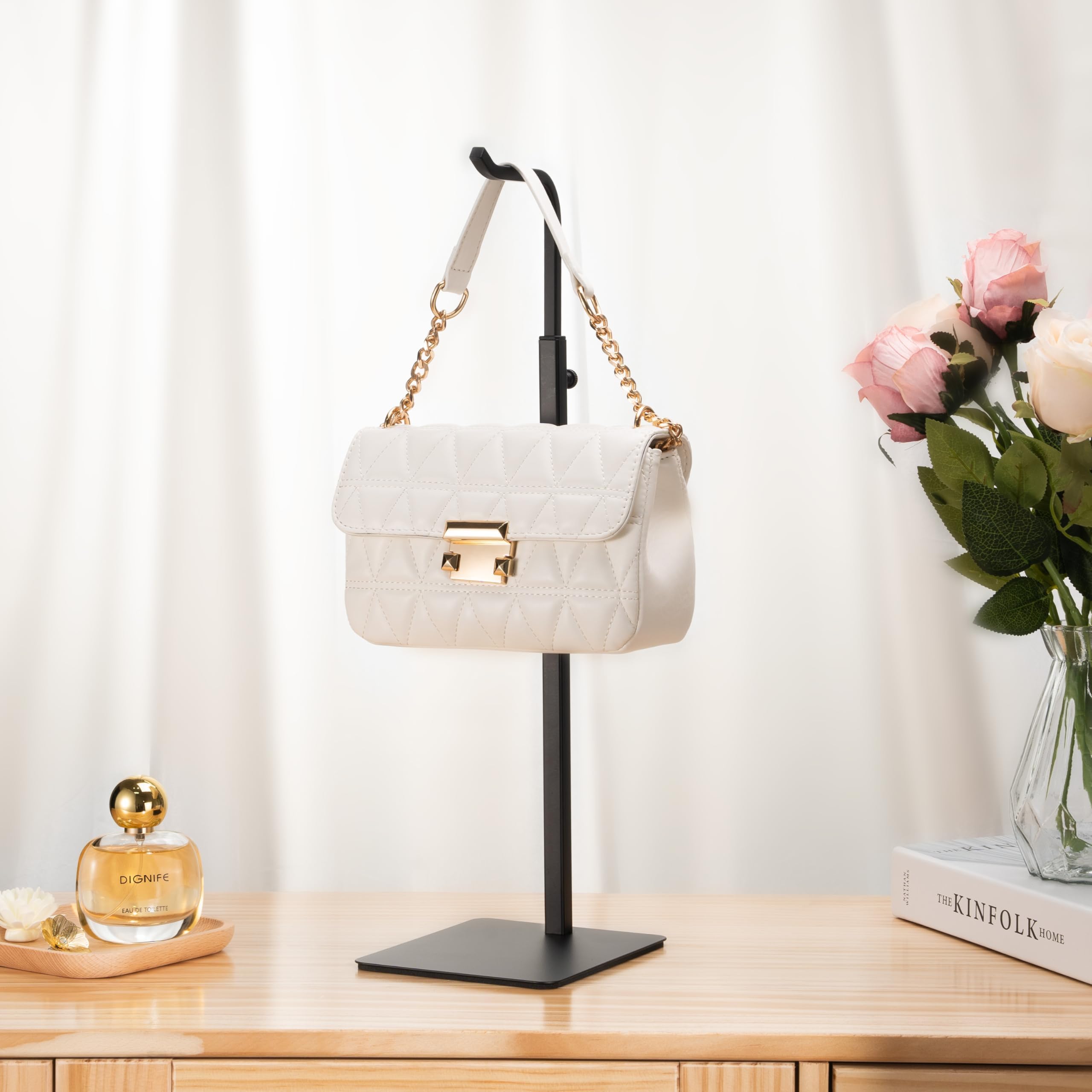Josmimic stand side profile demonstrating adjustable height and versatile display benefit