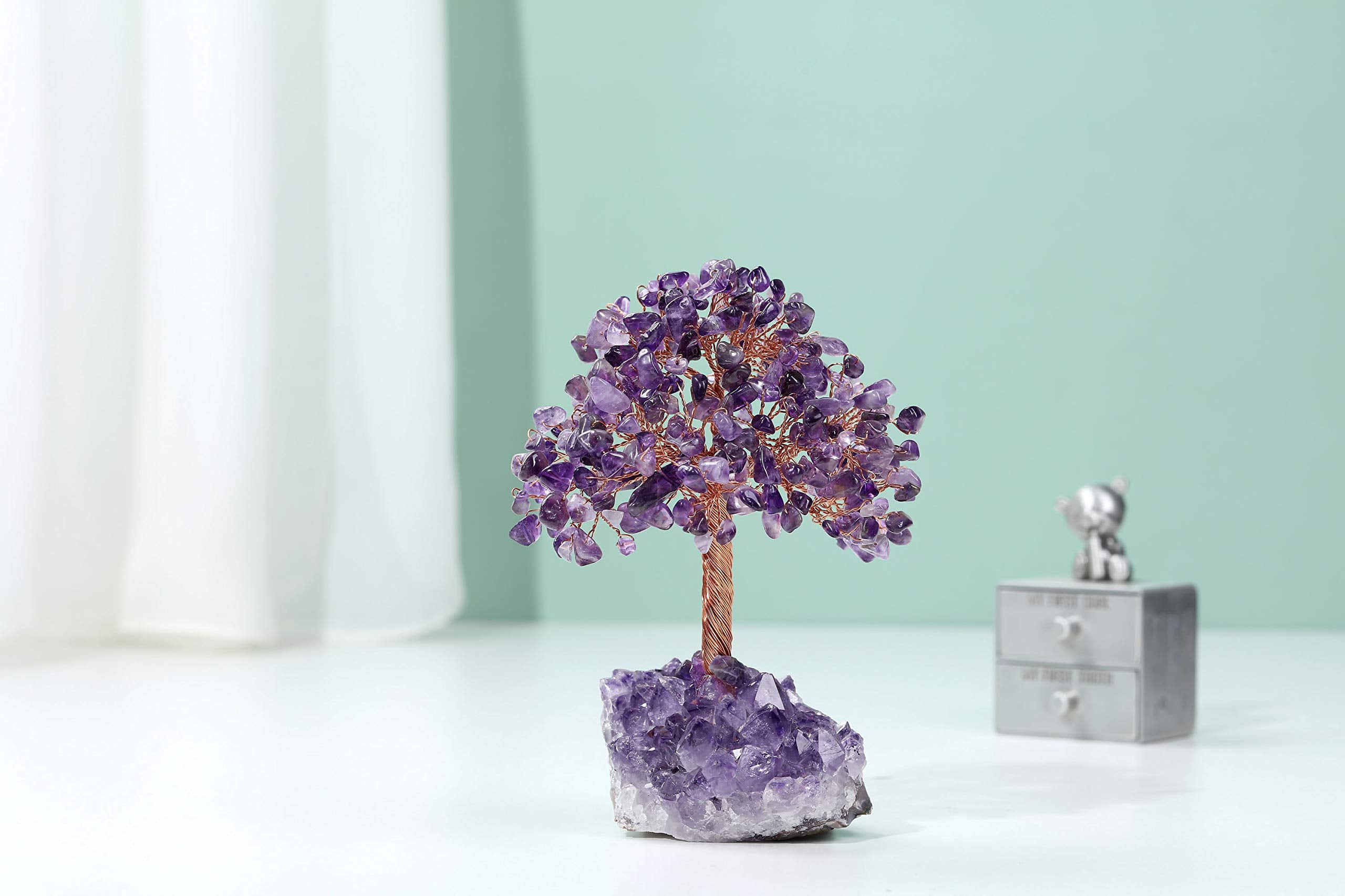 Jovivi amethyst cluster base close-up showing crystal formation and stability