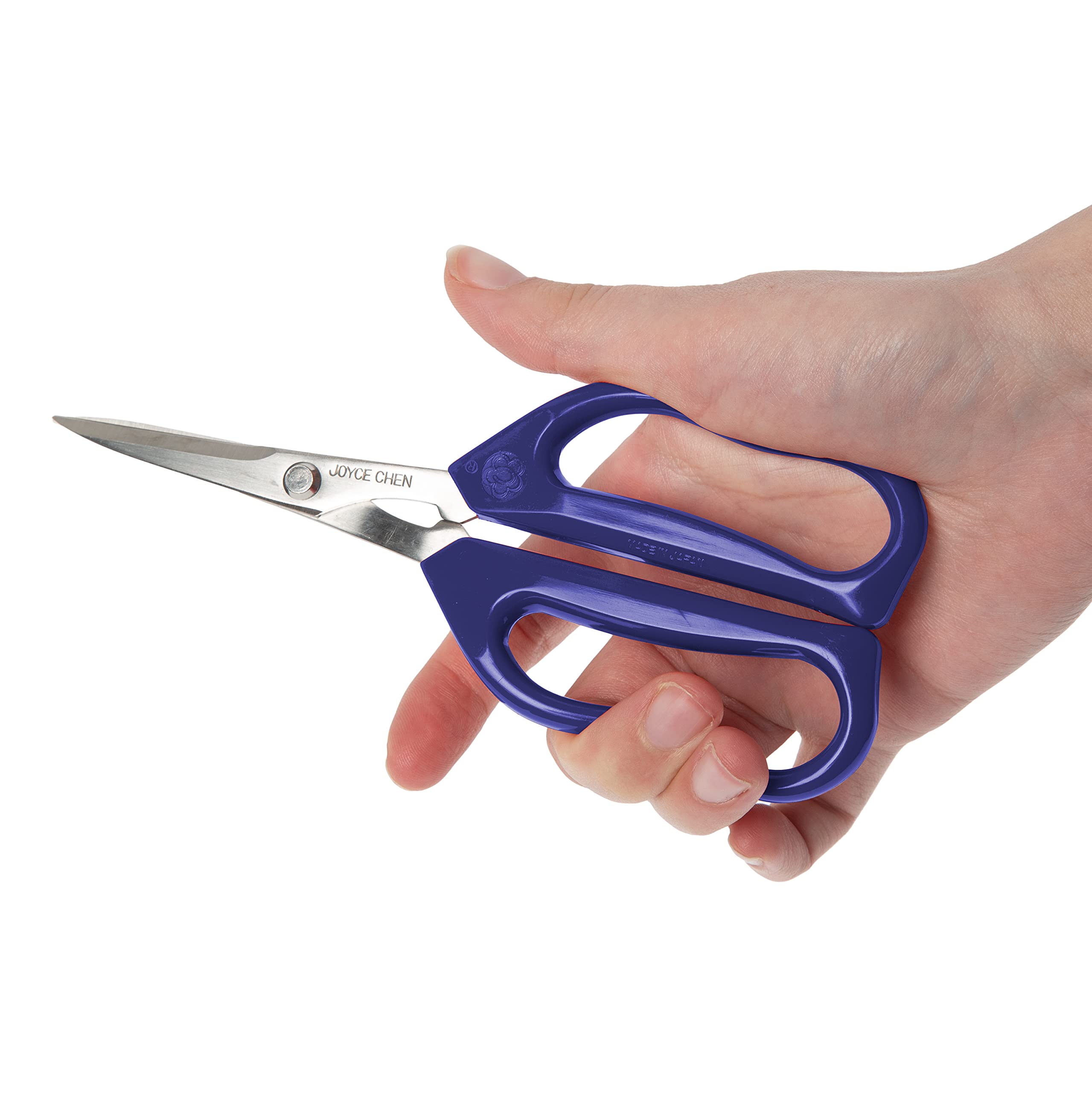 JOYCE CHEN scissors portioning cooked poultry illustrating safe controlled cutting