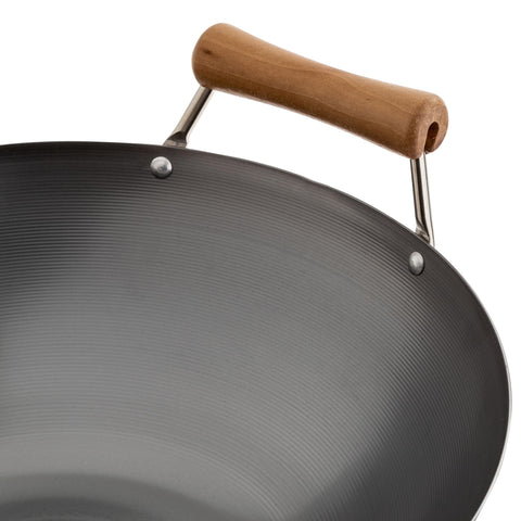 JOYCE CHEN seasoned patina surface showing improved nonstick benefit