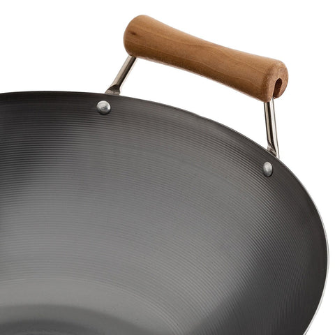 JOYCE CHEN steel lid placed on wok illustrating steaming and heat retention