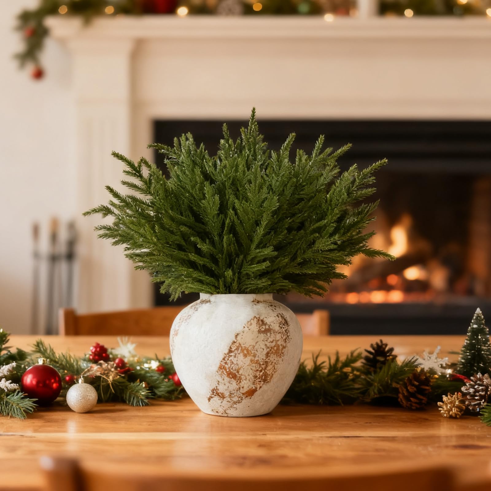 joyhalo styled on a mantel with lights demonstrating festive, low-maintenance décor