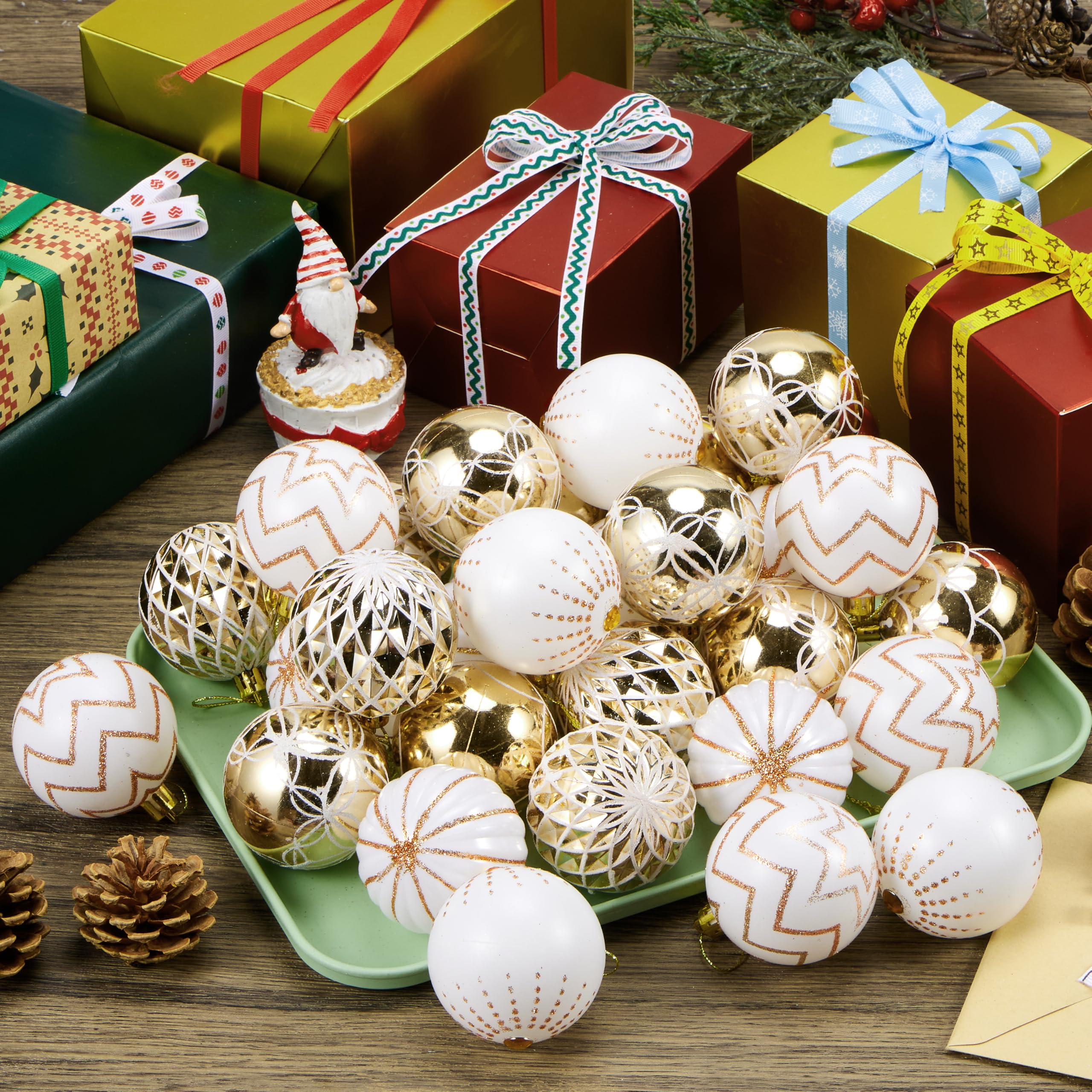 JOYIN gold and white ornaments arranged on wreath and garland for layered décor