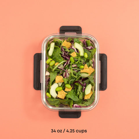 JoyJolt container filled with salad demonstrating fresh transport and meal prep convenience