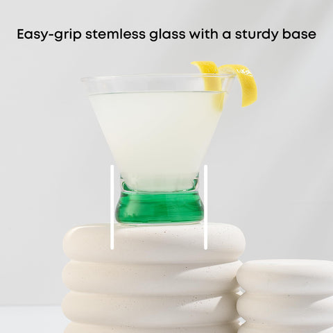 JoyJolt pouring a cocktail into Hue glass demonstrating drink use
