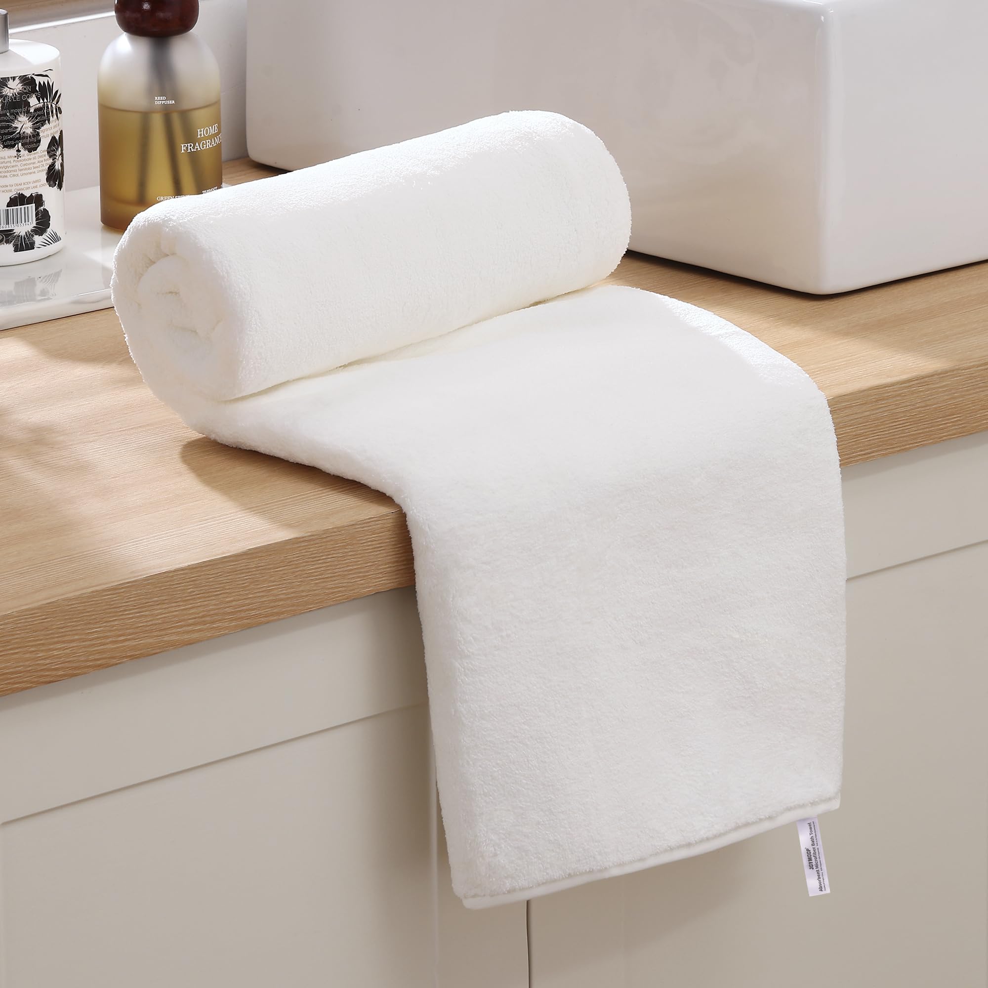 JOYMOOP single towel flat spread showing full 30x60 coverage and comfort