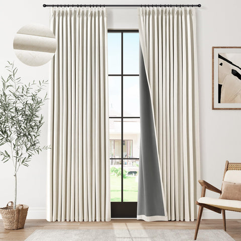 Joywell front view of cream pinch pleated panels showing polished look and full blackout benefit