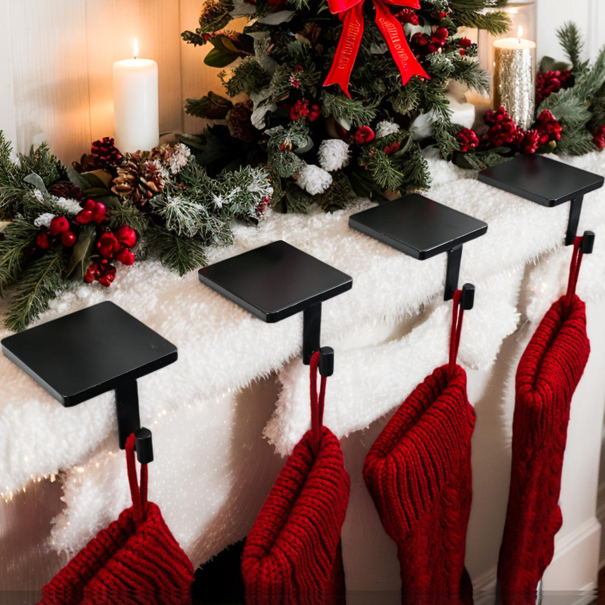 Joyyy front view of four black cast iron holders showing classic silhouette and stability