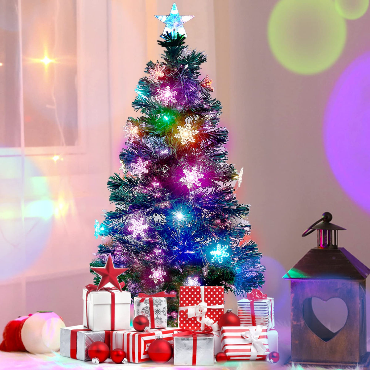Juegoal front view of 4 ft pre-lit tree showing full multicolored glow and festive presence