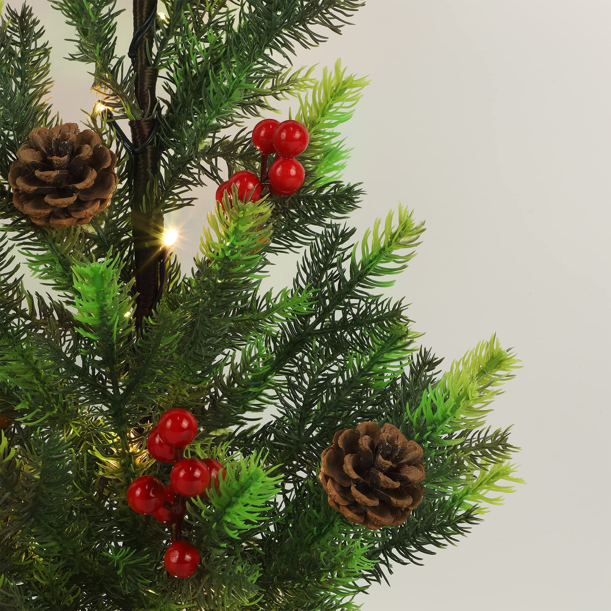 Juegoal lit nighttime tabletop display creating warm festive ambiance