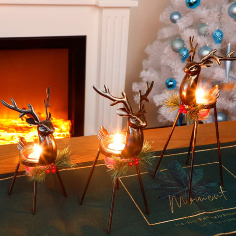 Juegoal height comparison of small, medium, tall reindeer to show scale on tabletops