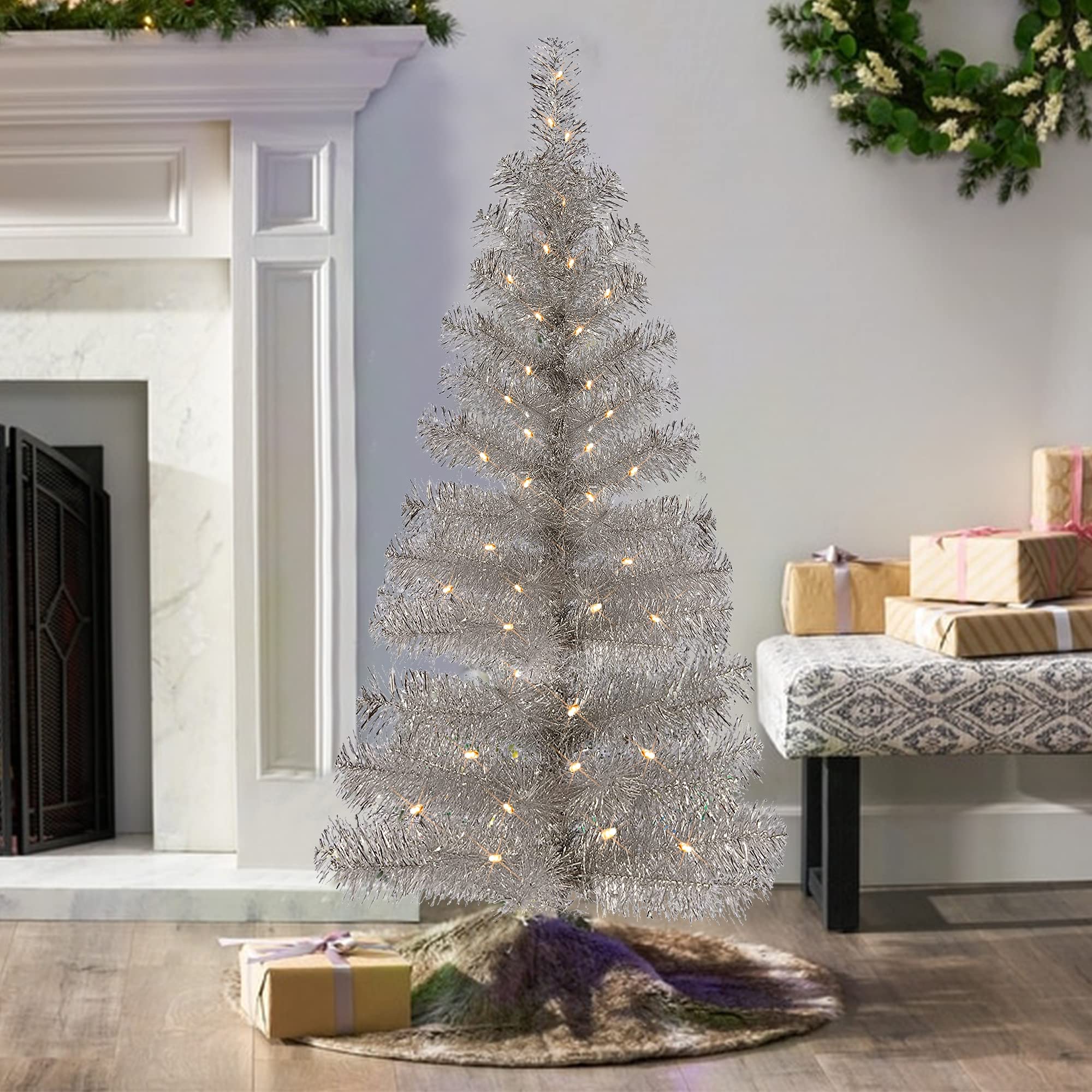 Juegoal tree in living room setting creating festive atmosphere and space savings