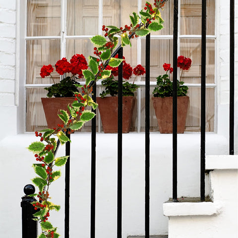 Juegoal garland wrapped on banister demonstrating flexible installation
