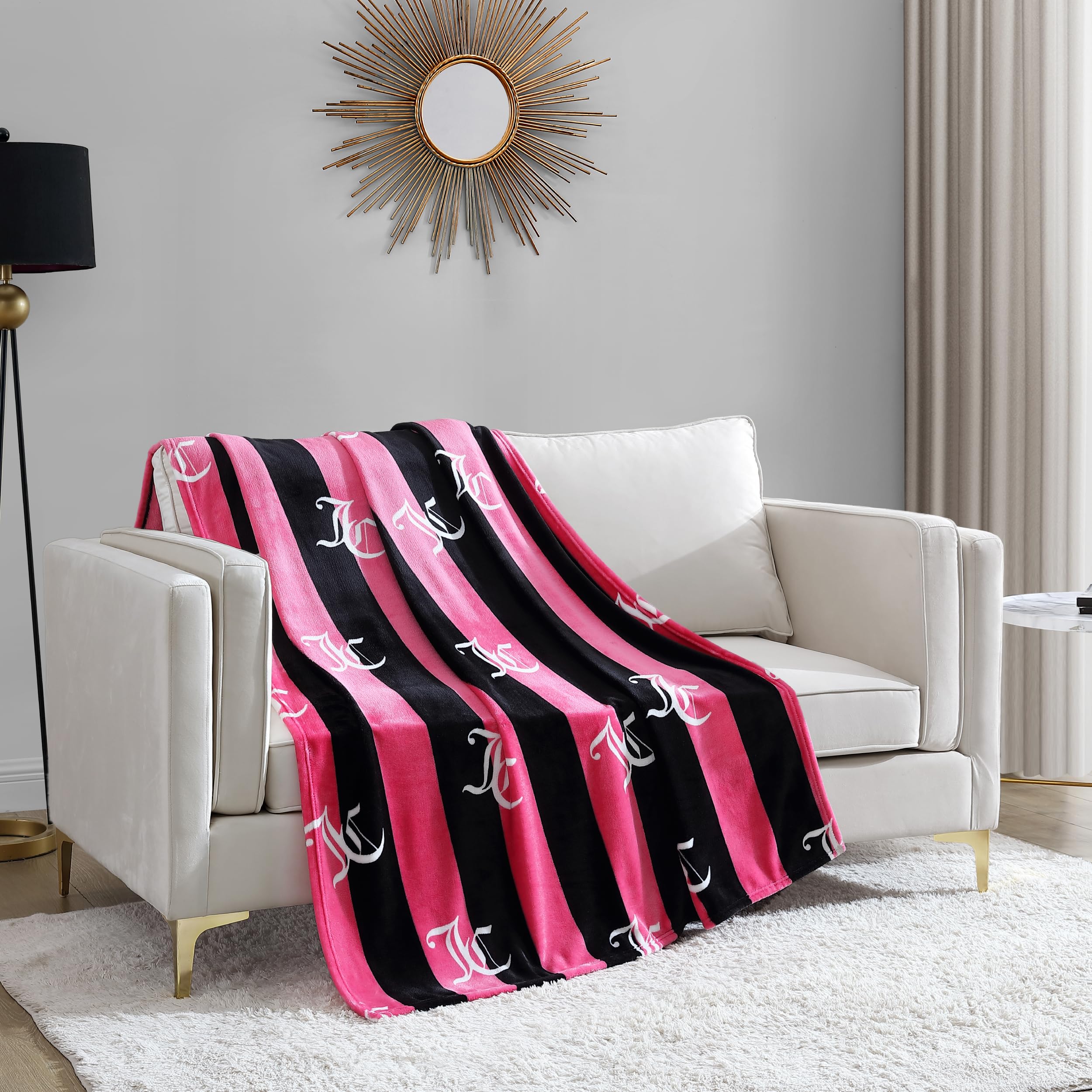 Juicy Couture front view of hot-pink throw showing full design and cozy appeal