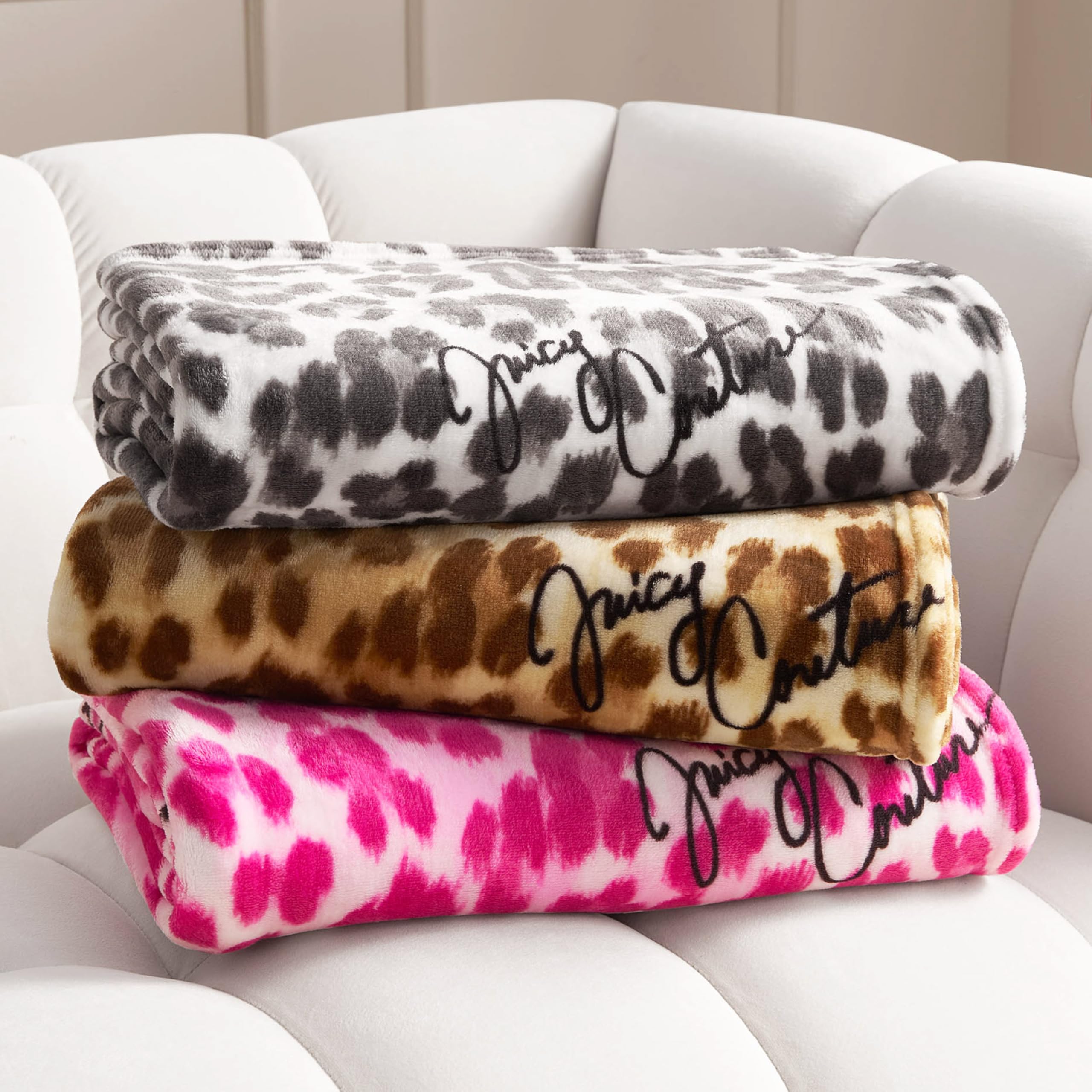 Juicy Couture throw in cozy living room scene inviting relaxation